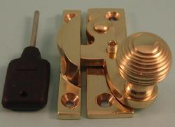 THD113L/PB Claw Fastener - Reeded Knob - Locking in Polished Brass